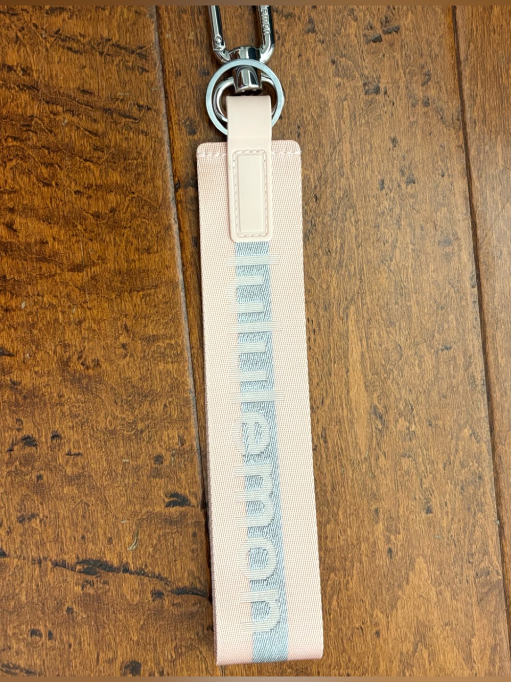 Lululemon Never Lost Keychain Pink Mist Silver Wordmark Strap NWOT